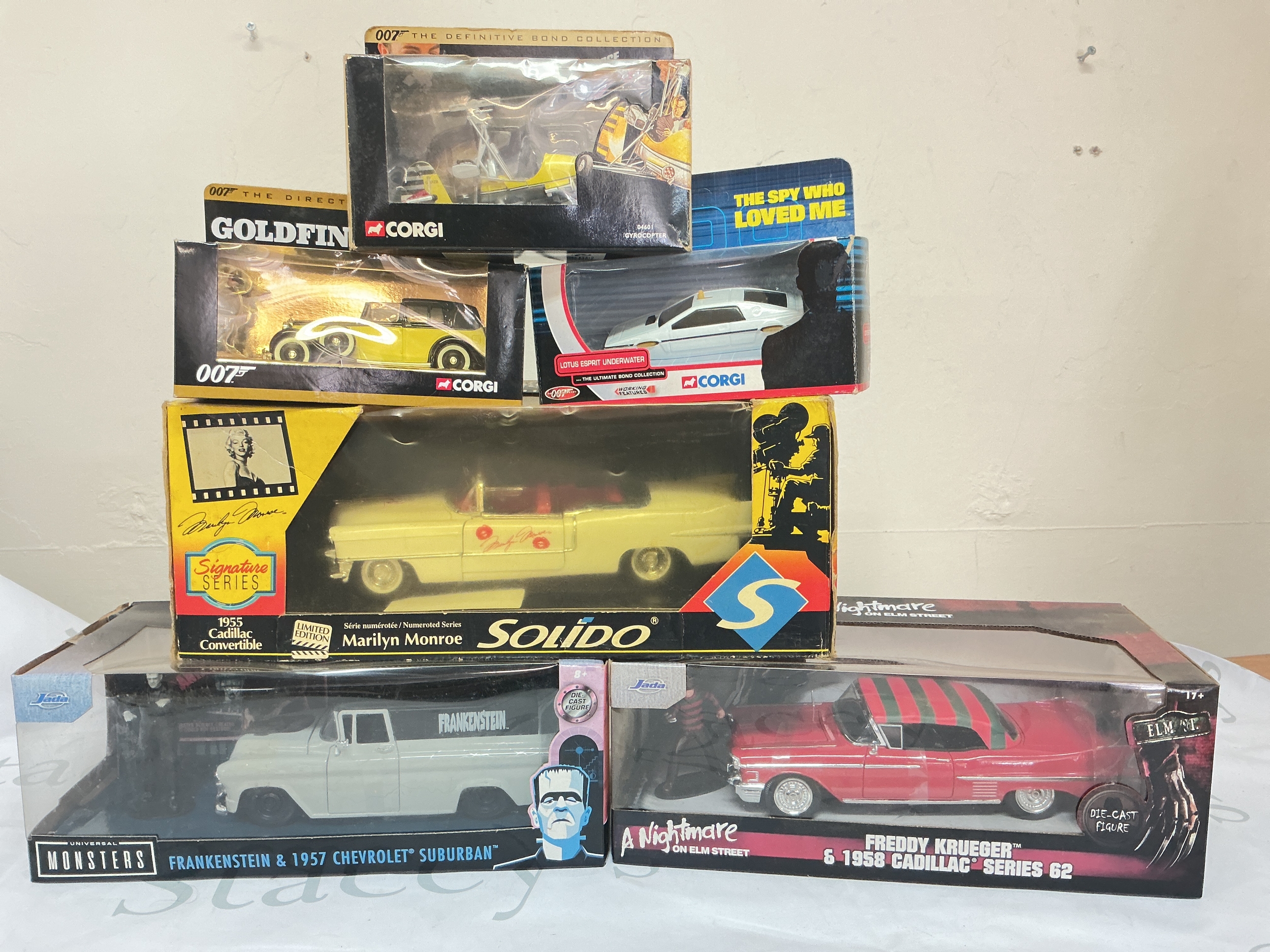 A Collection Of Boxed Diecast Including Corgi James Bond, Java Frankenstein, A Nightmare On Elm Street. a Solido Marilyn Monroe Cadillac. No Reserve.