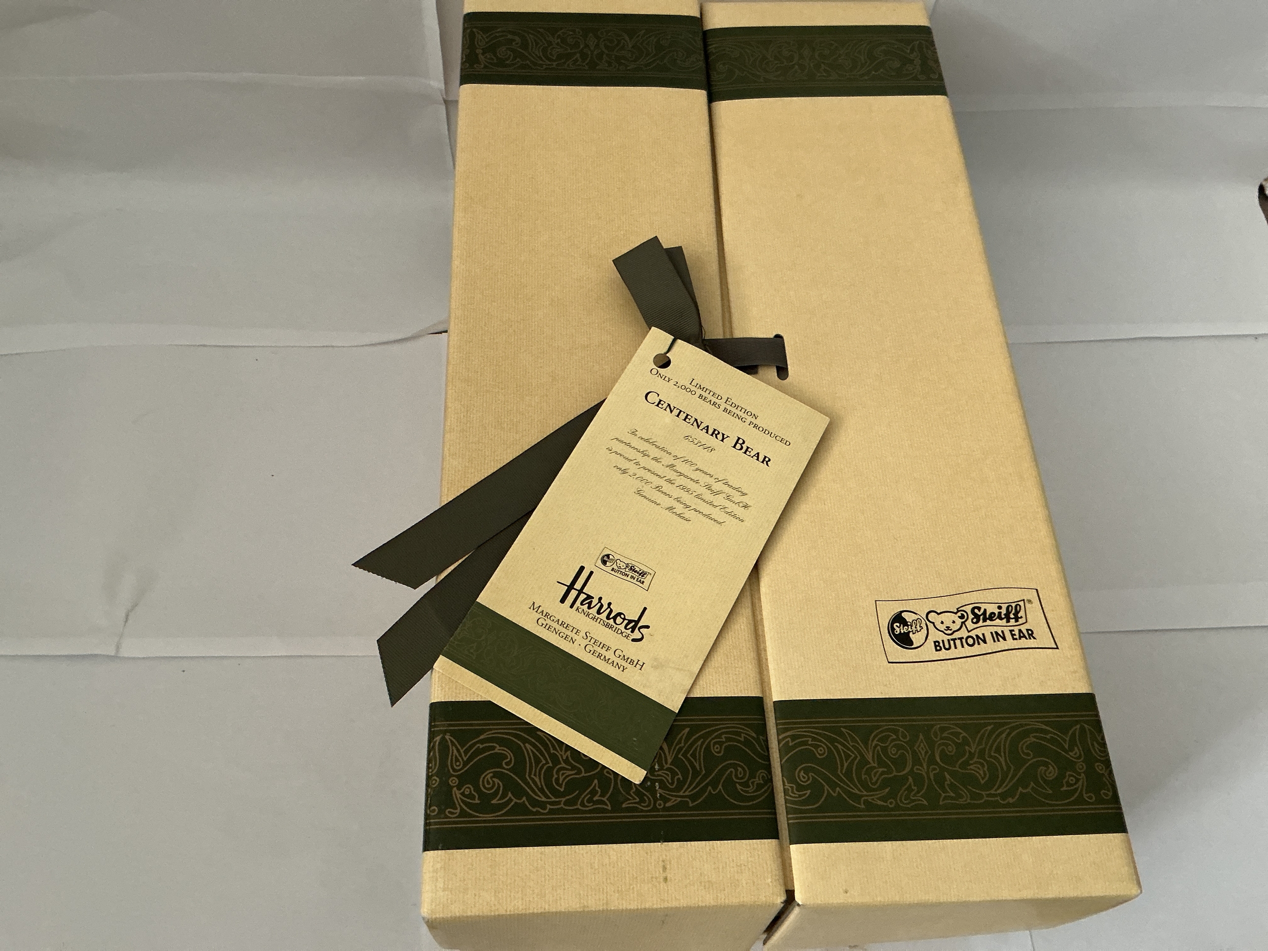 A Boxed Harrods Centenary Green Steiff Teddy Bear. No Reserve.