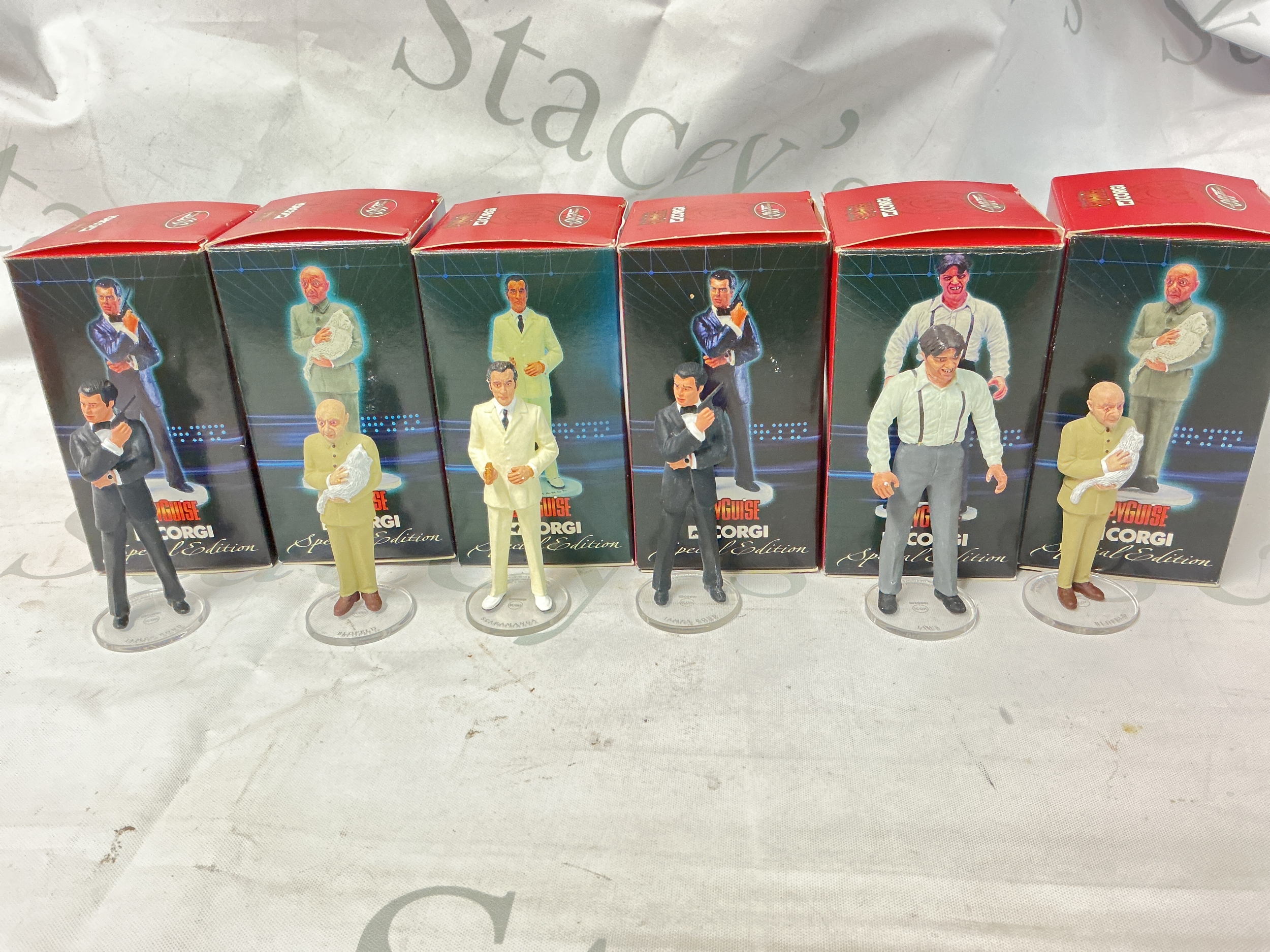 6 Boxed Corgi Spyguise James Bond Figures. No Reserve.