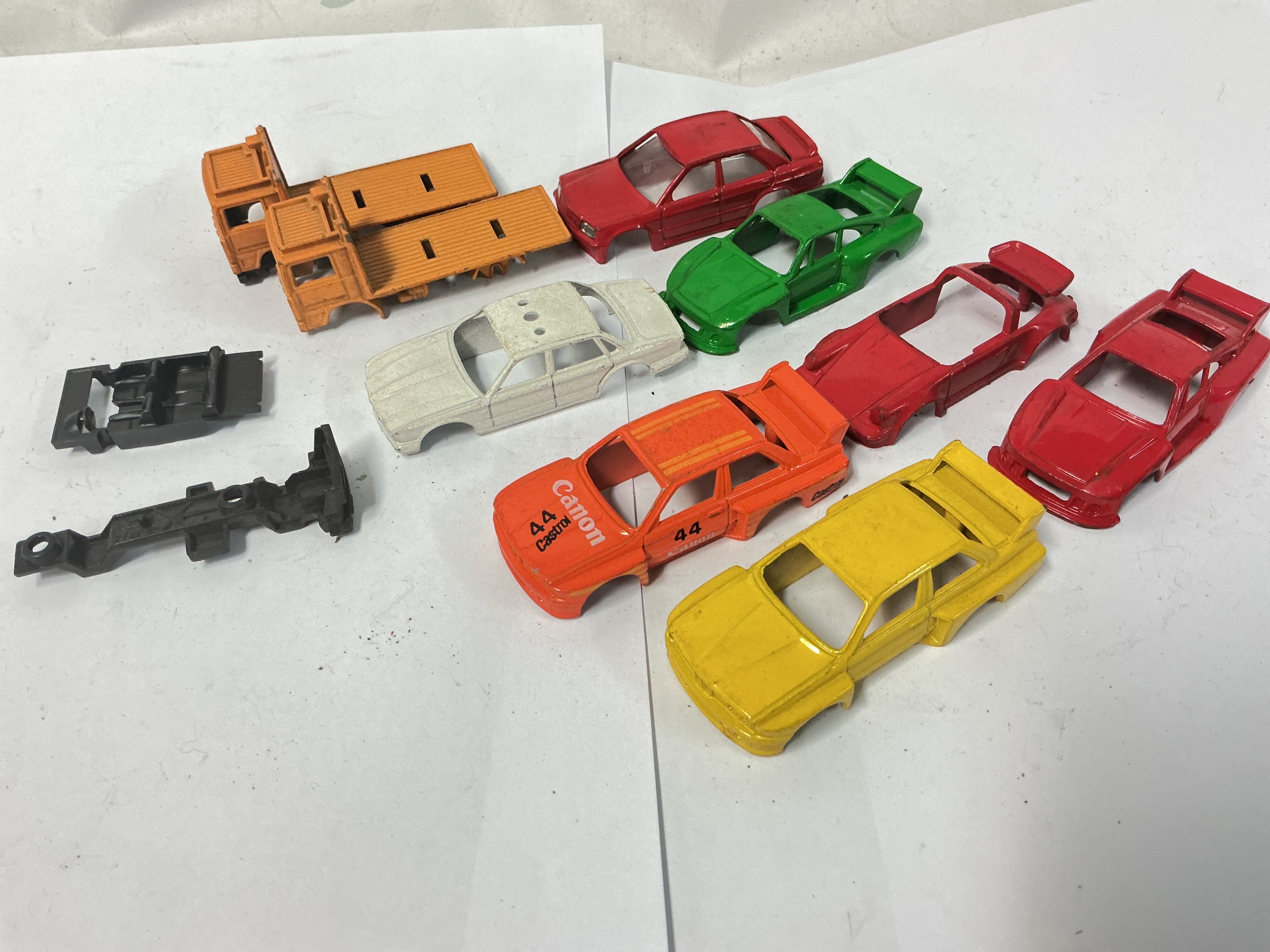 A Collection Of Corgi Juniors And Matchbox Superfast Never Assembled Unspun Body Castings.