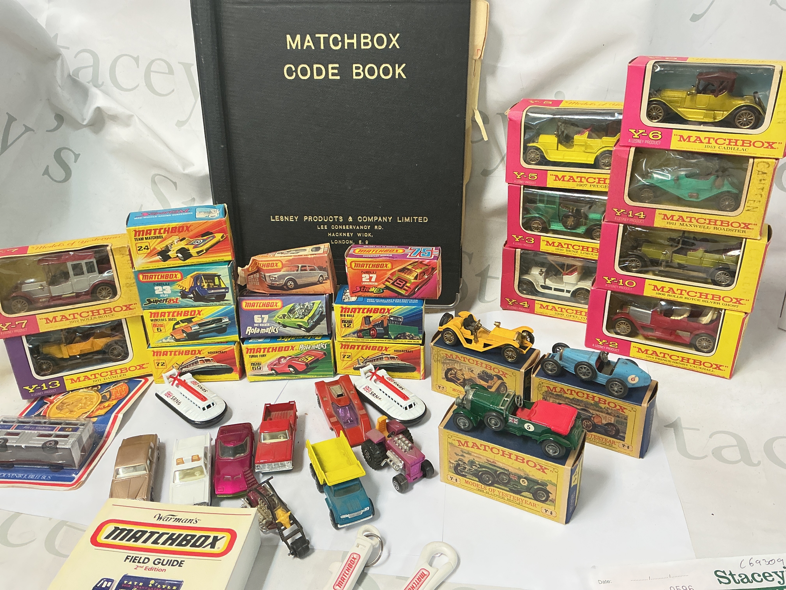 A Collection of Empty Matchbox Superfast Boxes, Matchbox Models Of Yesteryear, A Matchbox Staff Code Book, Keyrings Etc. No Reserve.