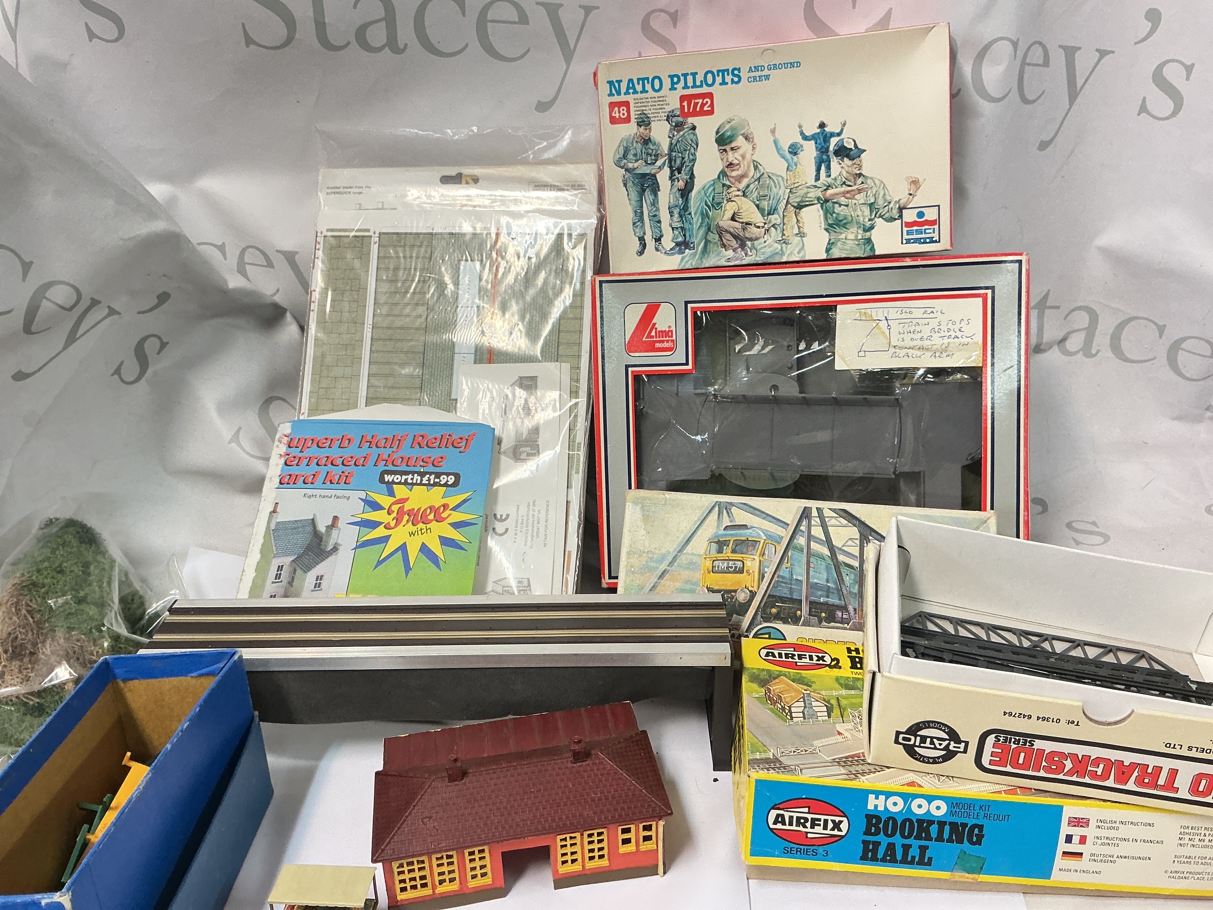 A Box Containing Built And Un Built 00 Gauge Model Kits And Spares. No Reserve.