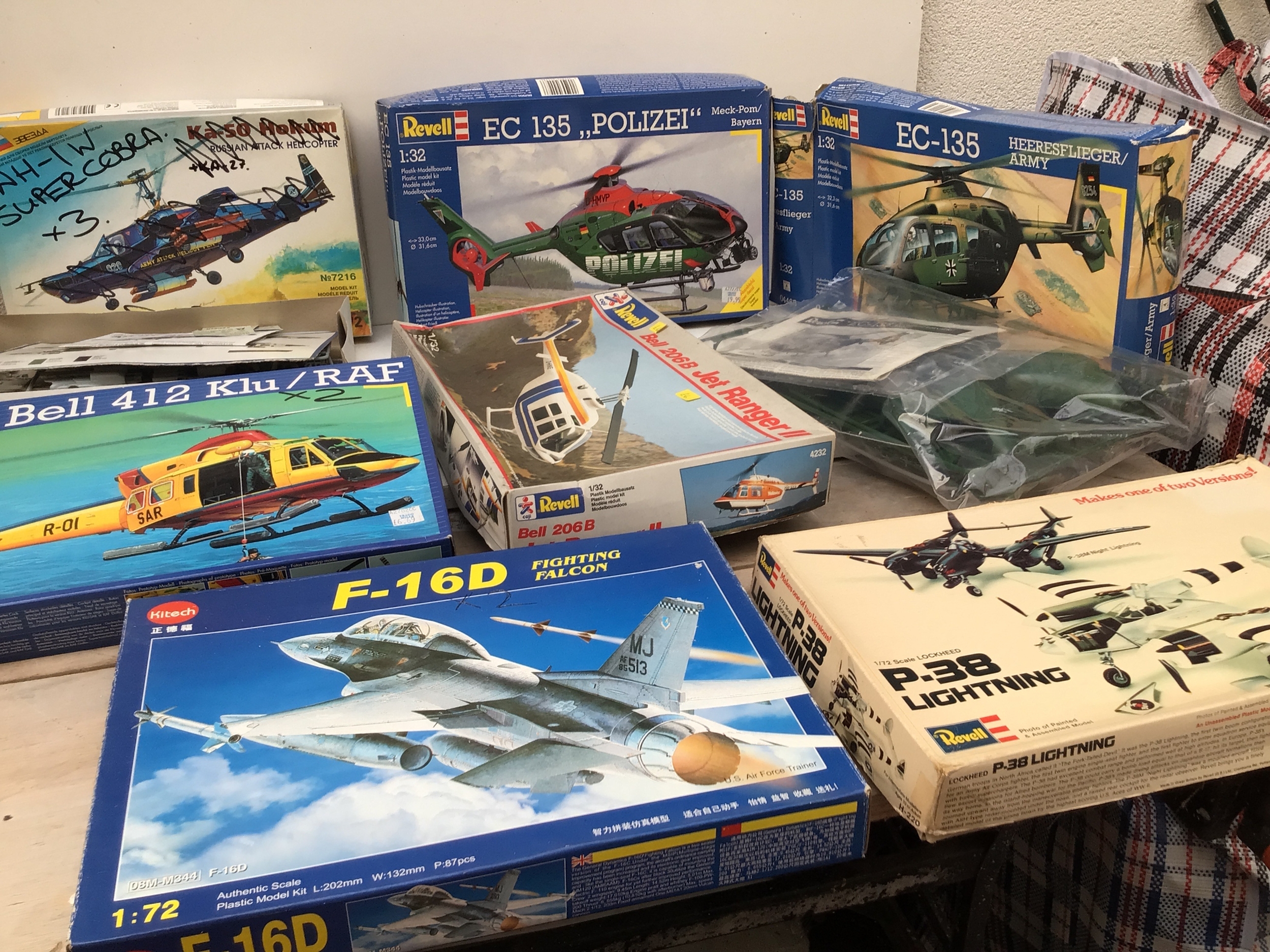 Bag containing a collection of boxed model kits by various manufacturers including Revell, Kitech, Dragon etc.  Collection features  aircraft in several scales.  Some boxes may contain more than one kit.  No reserve