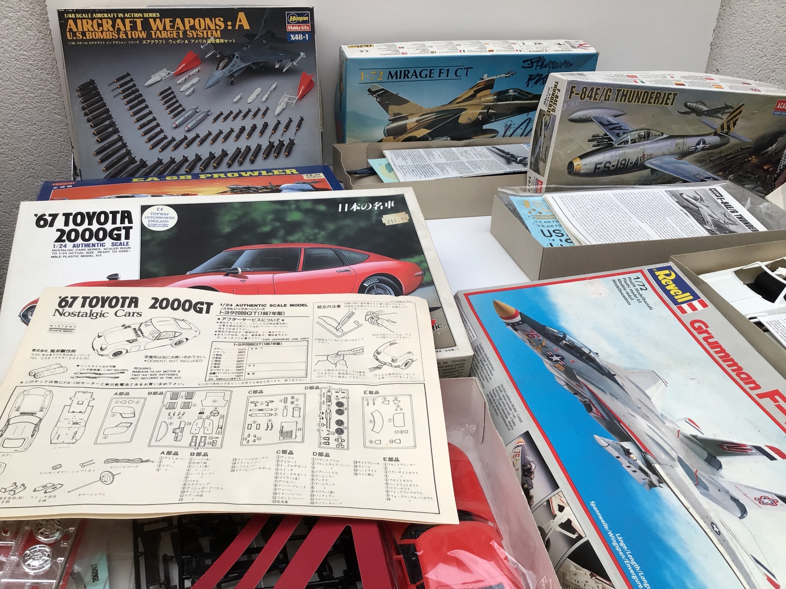A collection of model kit by Airfix, Revell, Kitech etc, featuring aircraft and cars in a variety of scales.No reserve