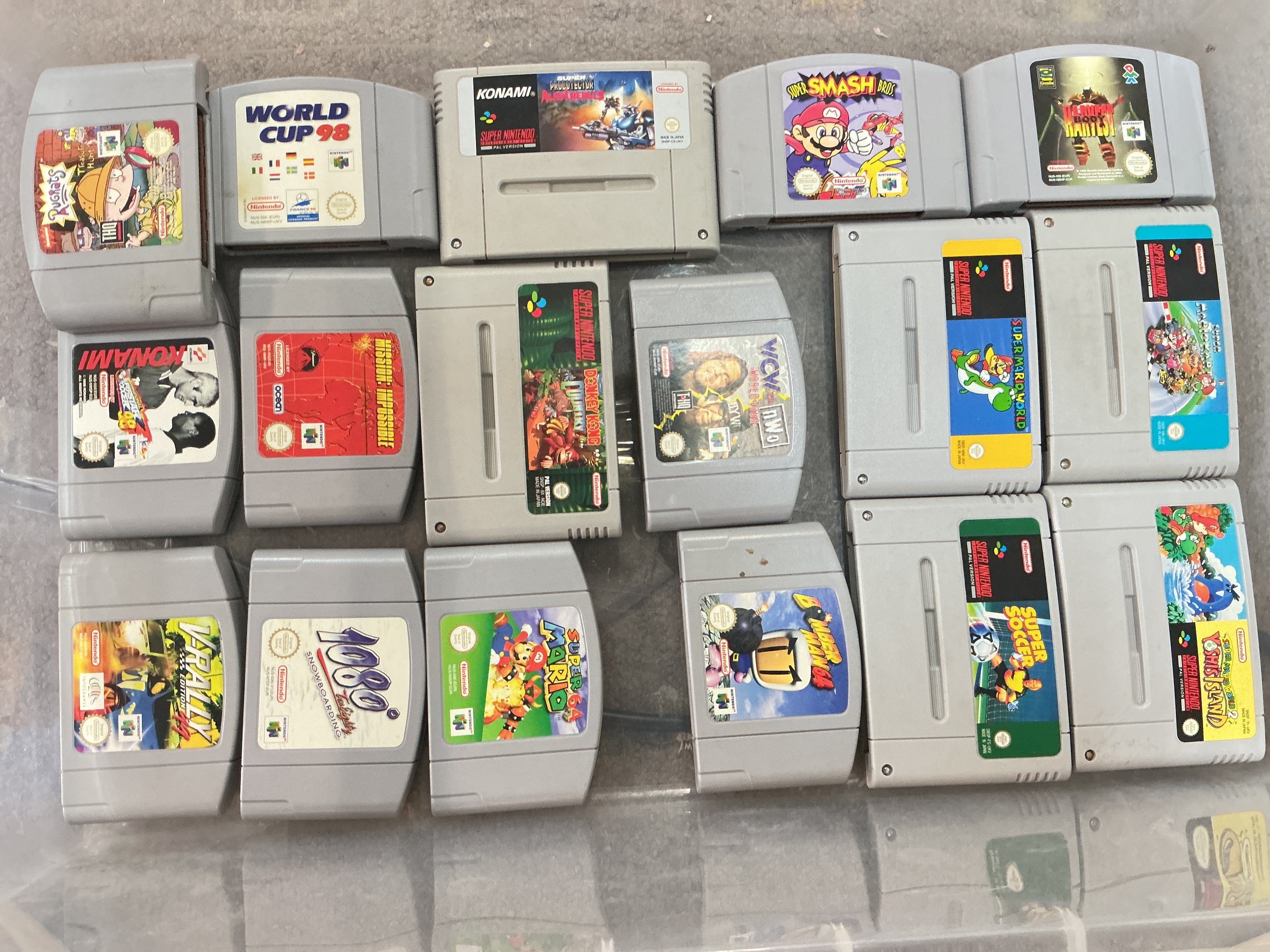 A Collection Of Boxed And Loose Nintendo 64 And Super Nintendo Games.
