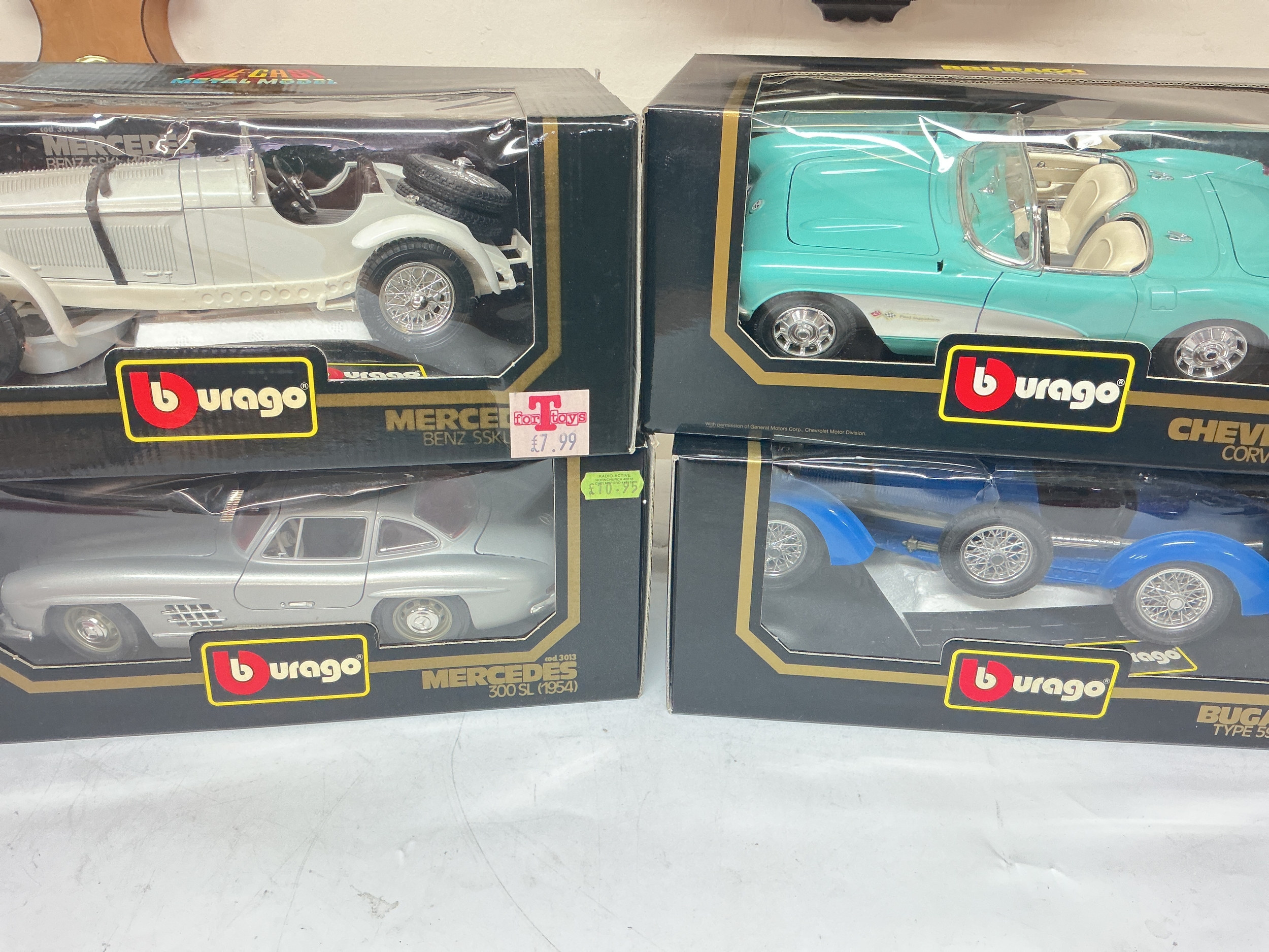 A Collection Of 9 Boxed Burago, Maisto 1/18 Scale Diecast. No Reserve.