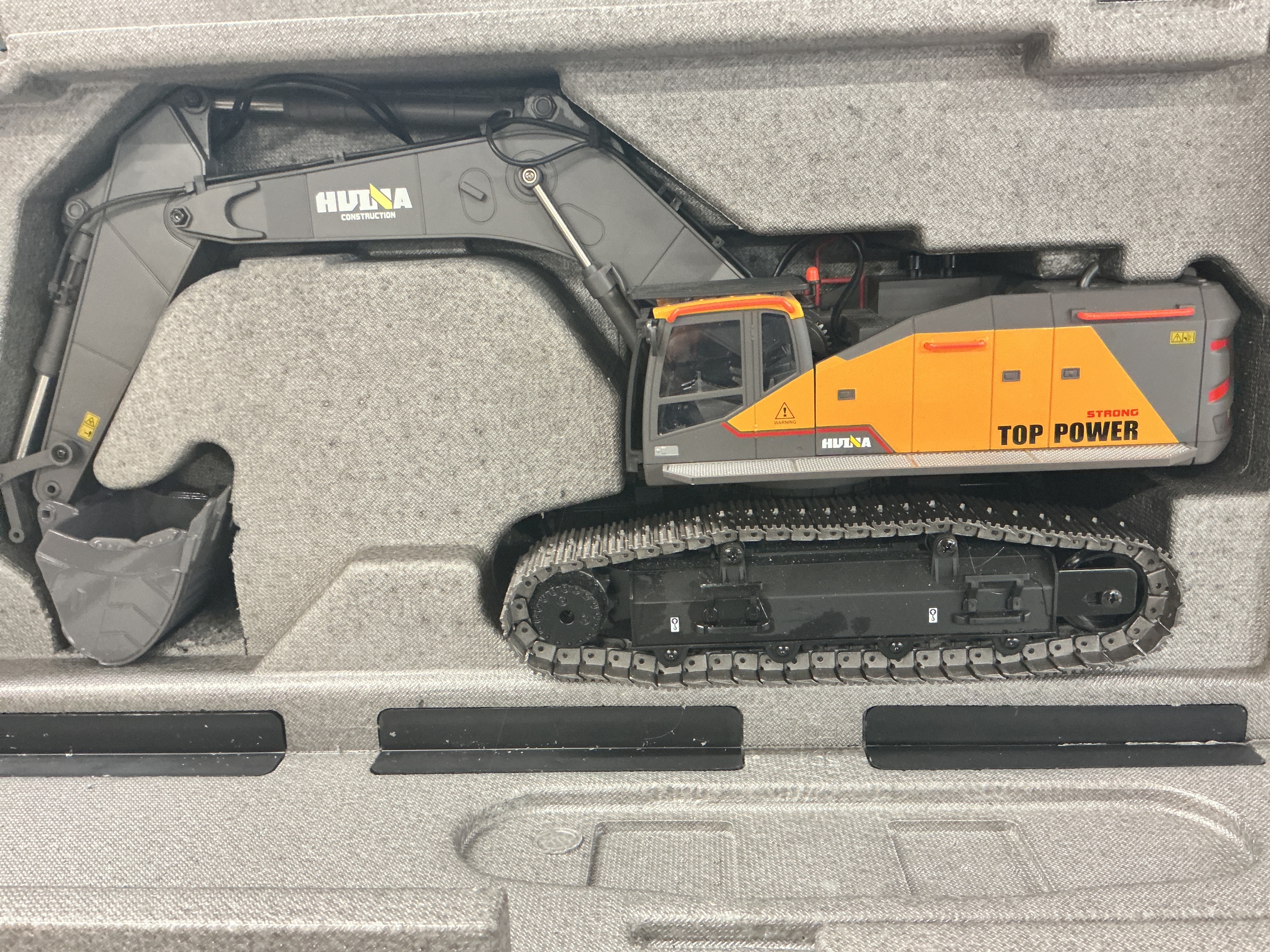 A Hui Na Remote Controlled Professional Excavator In Carry Case. No Reserve.