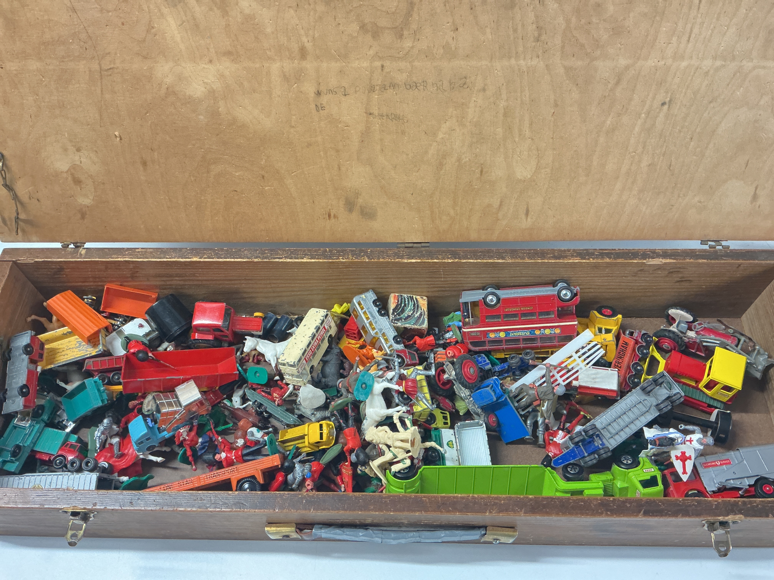 A Box Containing Playworn Diecast, Plastic Soldiers Etc. No Reserve.