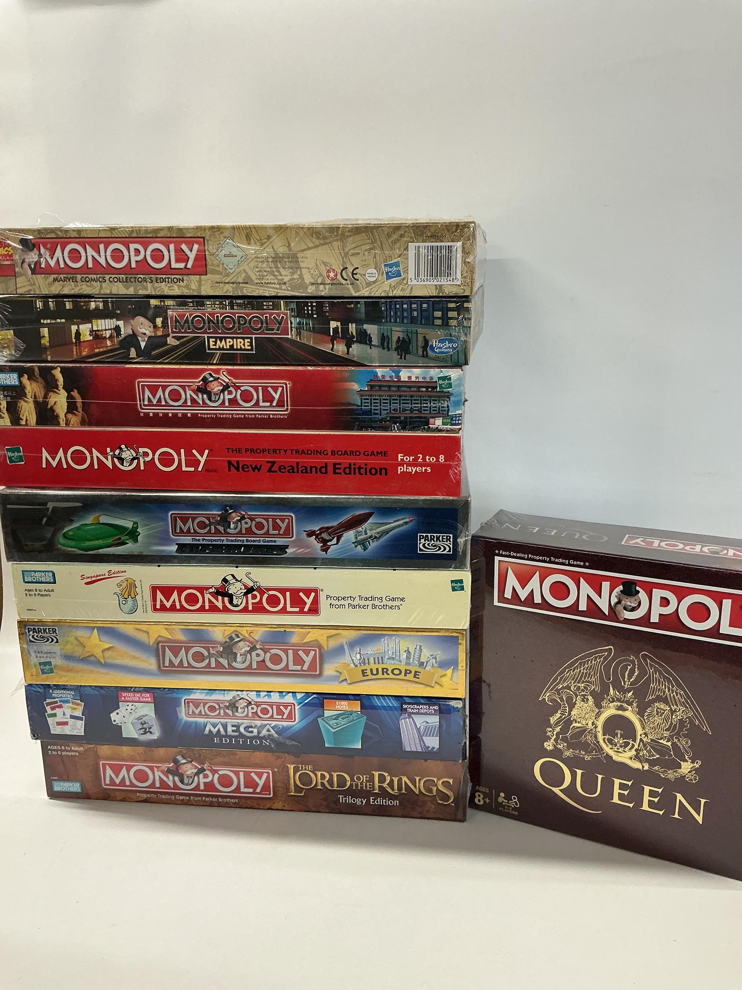 10 Boxed And Sealed Monopoly Games Including The Lord Of The Rings, Europe, Thunderbirds, Marvel, Queen Etc. No Reserve.