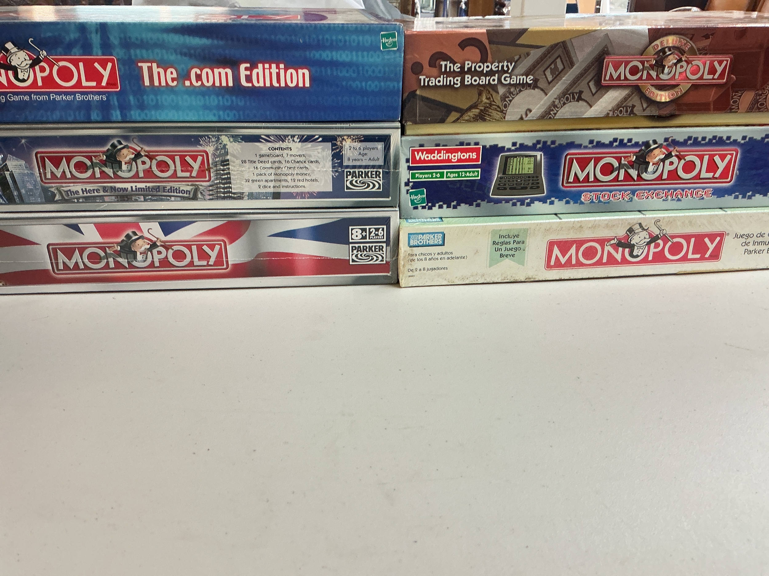 A Collection Of Monopoly Board Games (Some Sealed) And A Star Wars Chess Set.