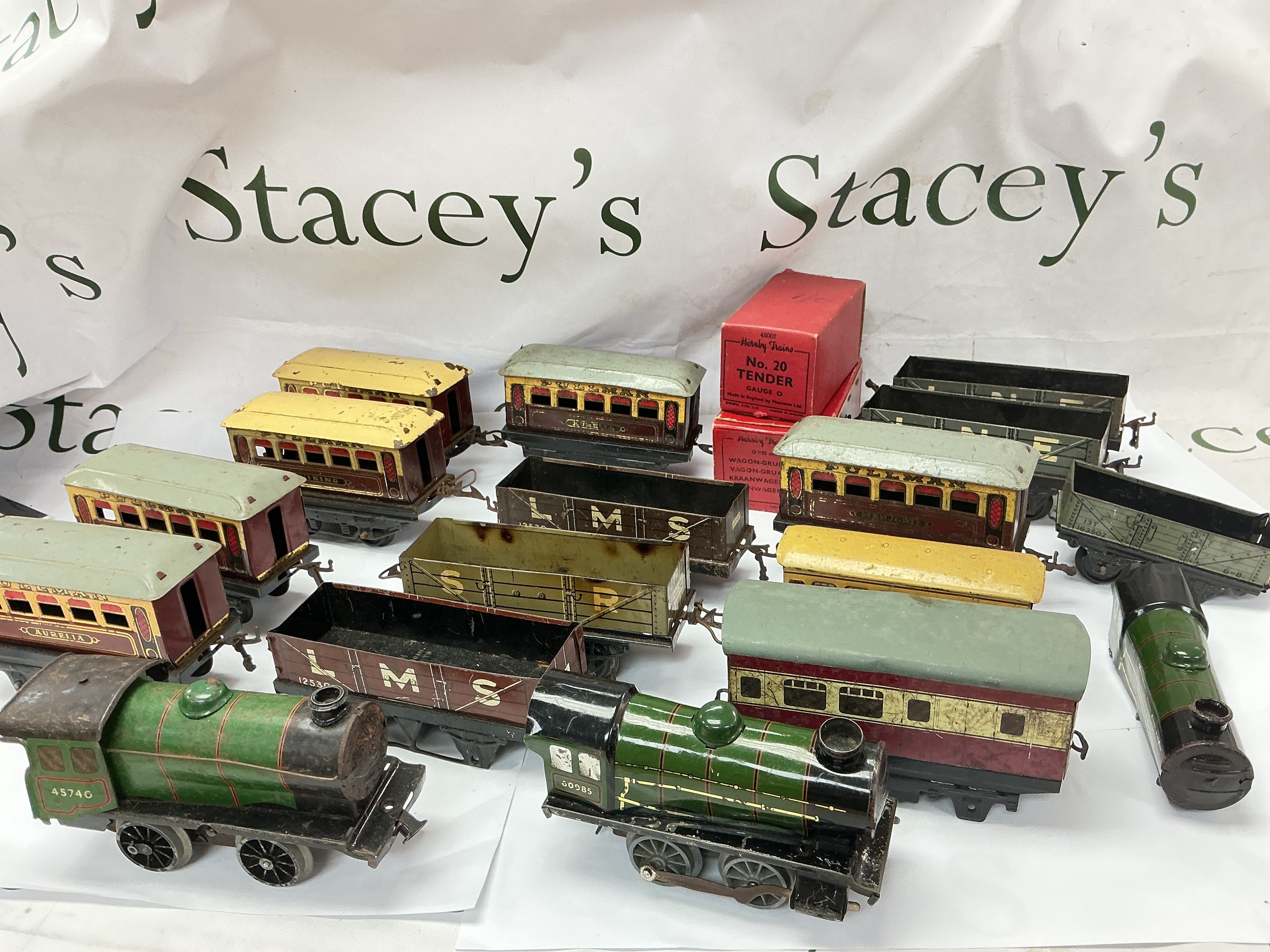 A Collection Of 0 Gauge Locos, Coaches And Wagons.