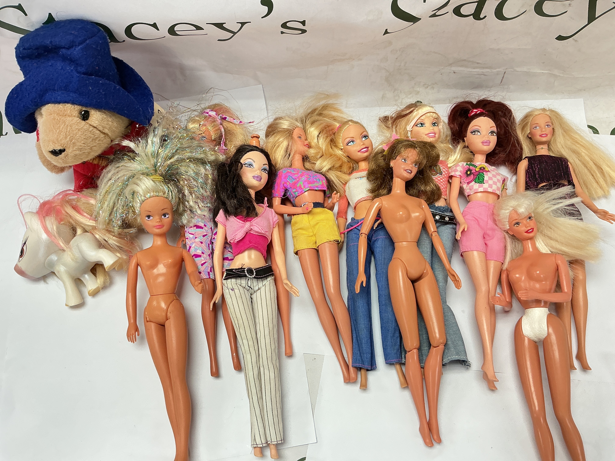 A Collection Of Loose Barbies/Sindys, A Paddington And Brats Pony. No Reserve.