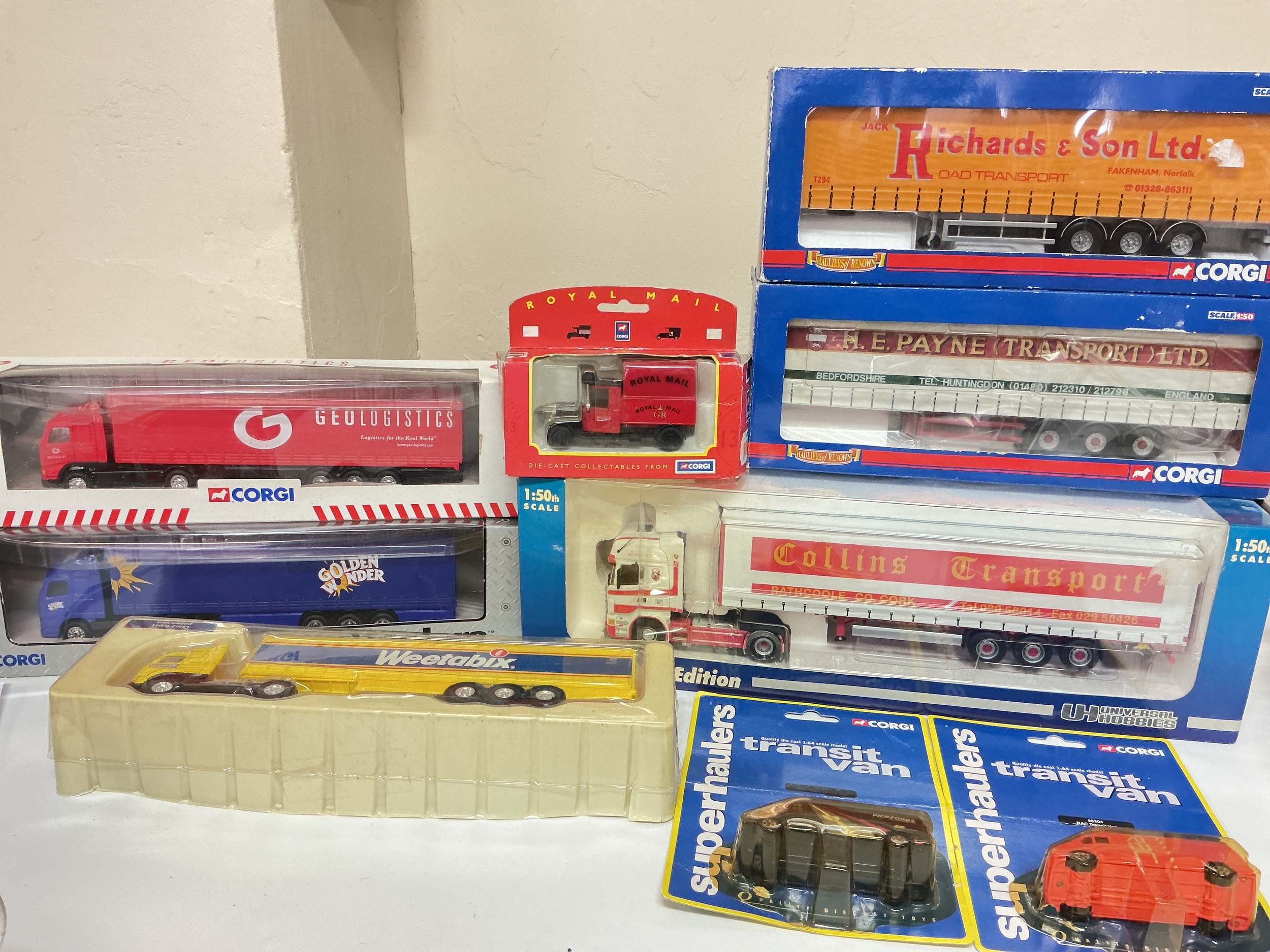 A 1/50 Scale Universal Hobbies Scania Wide Curtain Side Trailer Plus Corgi Haulers Of Renown And Superhaulers.