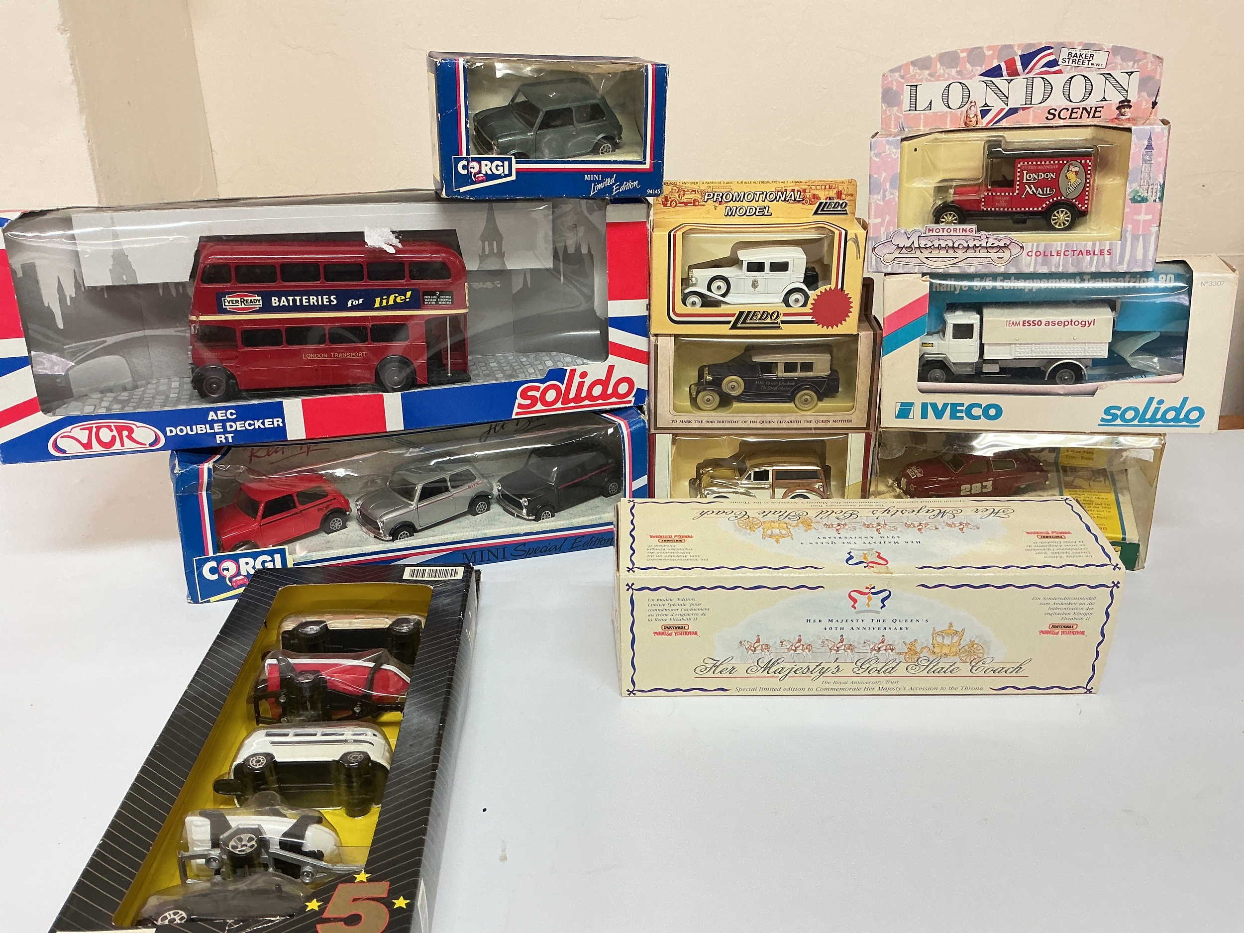 A Collectin Of Boxed Diecast Including Corgi, Solido, Maisto Etc plus Charbens Royal Coach, plus one Other. No Reserve.