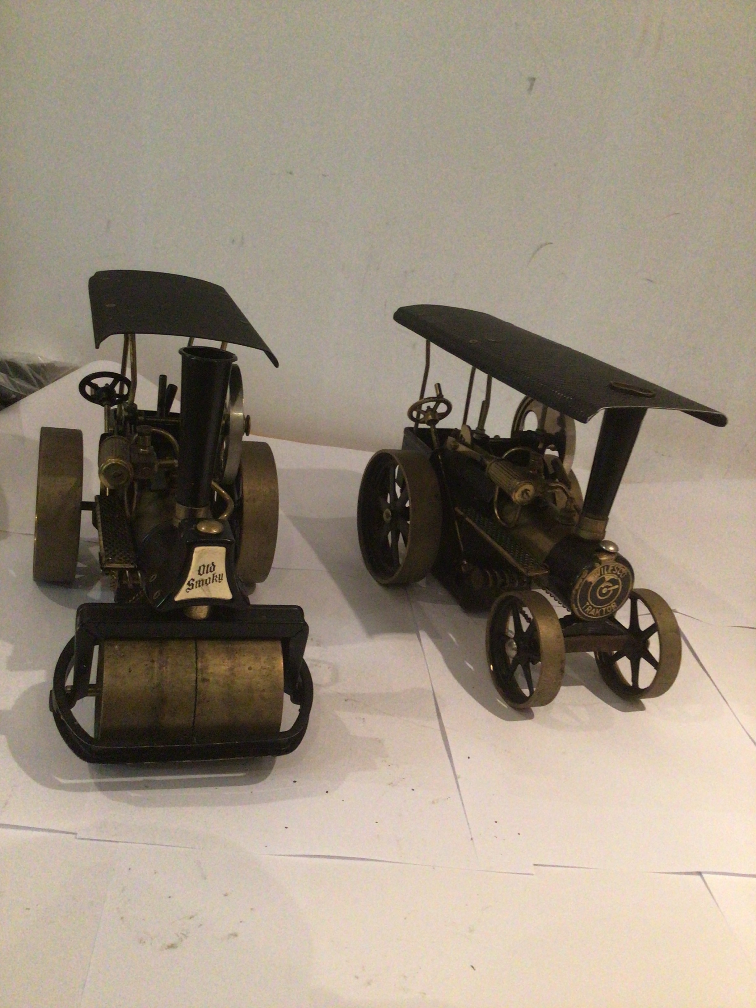 Two small model steam engines manufactured by Wilesco, featuring OLD SMOKEY roller and A Traktor.  Untested.