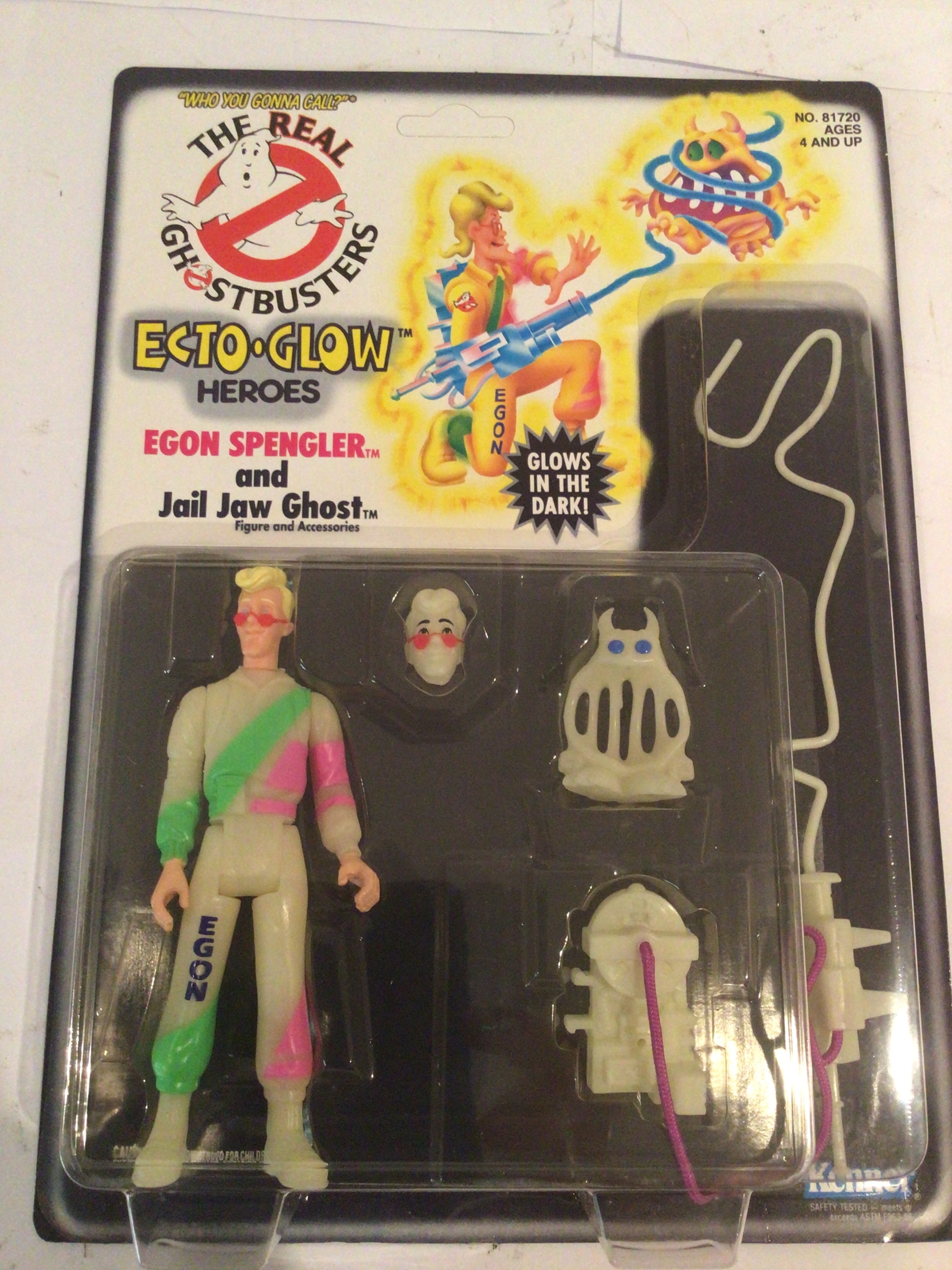 Unpunched and in unopened blister packaging an original Ghostbusters Egon Spengler in the ECTO-Glow heroes also includes the Jail Jaw Ghost.