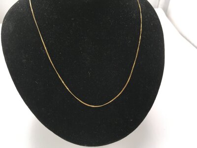 An 18ct yellow fine chain.
1.10g