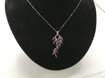 A 9ct white gold necklace with amethyst pendant which is approximately 35mm
3.18g