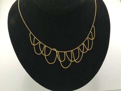A 9ct yellow gold bead necklace
4.44g