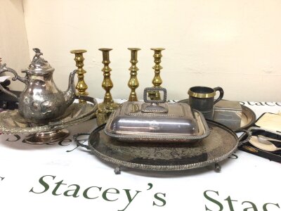 A box containing a quantity of silver plate and brassware including 19th century pewter tankards candle sticks silver plated baskets and lots more.