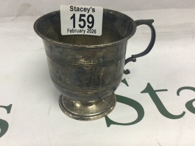 A small silver mug London hallmarks 103 grams.