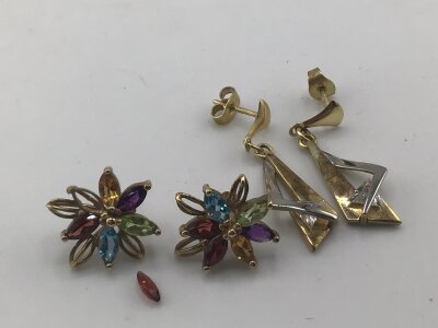 A pair of modern design 9carat white and yellow gold earrings and a pair of gold multi coloured stone earrings