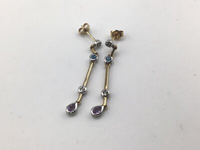 A Pair of white and yellow gold long drop earrings set with amethyst and aquamarine stones. Weight 2.4g