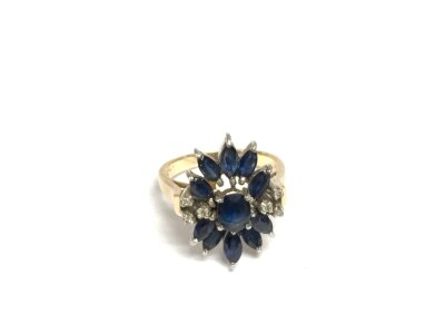 An 18ct gold sapphire and diamond floral cluster ring, approx 5.6g and approx size O.