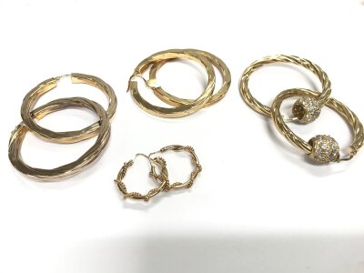 Four pairs of 9ct hoop earrings, approx weight 28.05 grams.