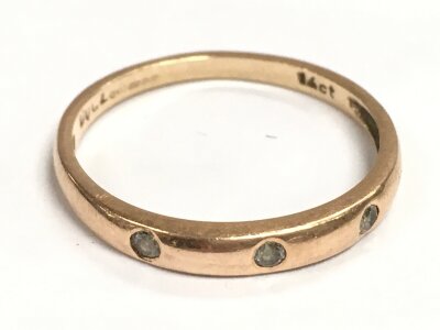 A 14ct rose gold ring set with small diamonds, size N, 1.4g total weight