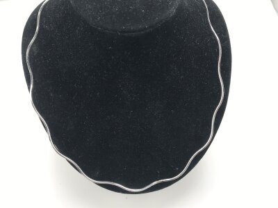 A 9ct white gold modern design necklace.