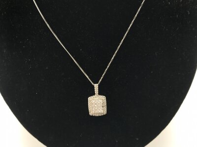 A 9ct white gold necklace with pendant set with white stones.
2.45g