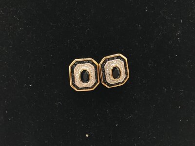 A pair of 9ct gold sapphire and diamond earrings.
2.93g