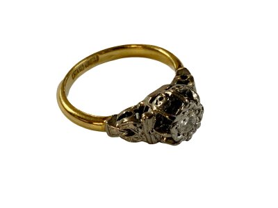 A 1940s 18ct yellow gold and platinum solitare diamond ring, Size J.