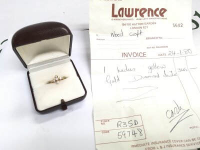 An 18ct gold diamond ring set with five diamonds, size K, 2.4g total weight