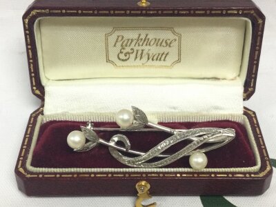 A silver sterling brooch