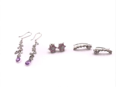 Two pairs of 9ct white gold earrings and a pair of silver earring set with CZ