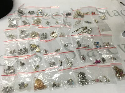 A collection of Silver earrings, including some non silver examples