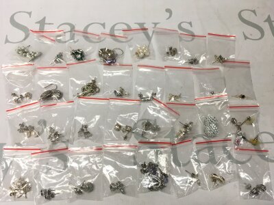 A collection of silver earrings, including some non silver examples