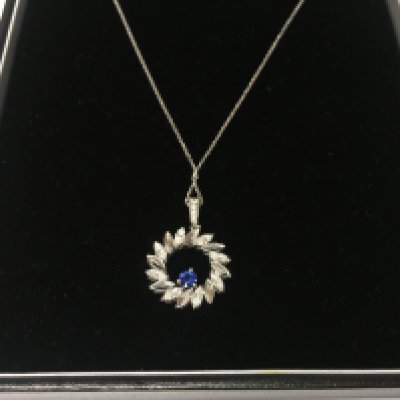 A 14ct white gold diamond and sapphire necklace. Approximately 3.80g