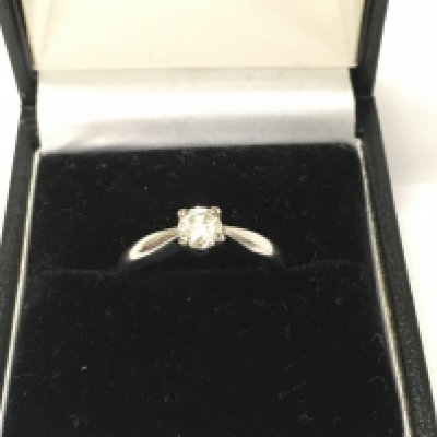 18ct white gold diamond solitaire ring.