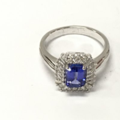 A 14ct white gold diamond and tanzanite rings. Size M