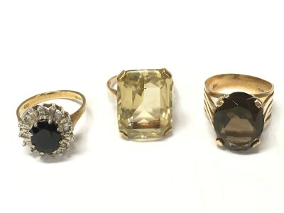 Three 9ct gold stone rings , citrine ,sapphire and quartz. 17.5g total weight. Size P and N.