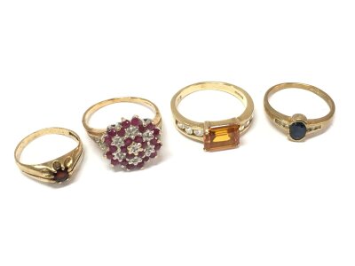 Four 9ct gold rings including ruby, sapphire etc. sizes O,P, L, G. 10g total weight