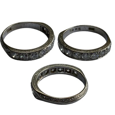 An 18ct white gold half eternity ring, approx 1ct diamonds.