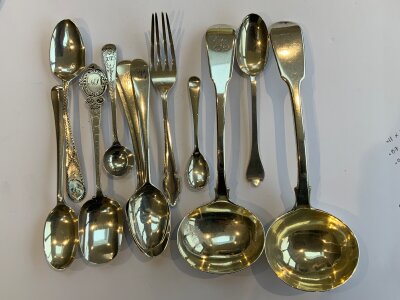 A small collection of sterling silver cutlery (approximately 270g)  together with a collection of plated cutlery