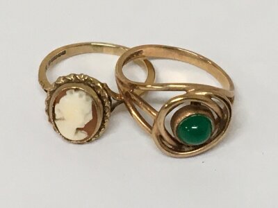 Two 9carat gold rings  set with a green cabochon and one other with Cameo (2) 5.5g