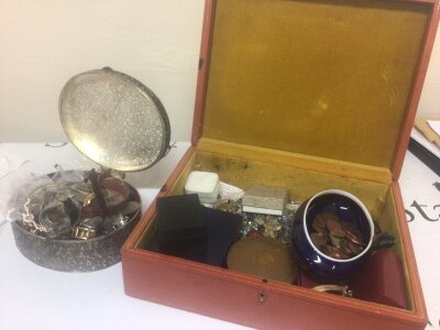 A collection of costume jewellery watches and coins.