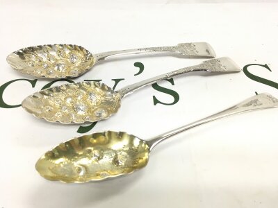 Three silver hallmarked berry spoons, total weight 133g