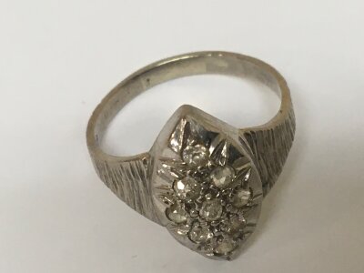An 18carat white gold ring set with small brilliant cut diamonds ring size S weight 5g